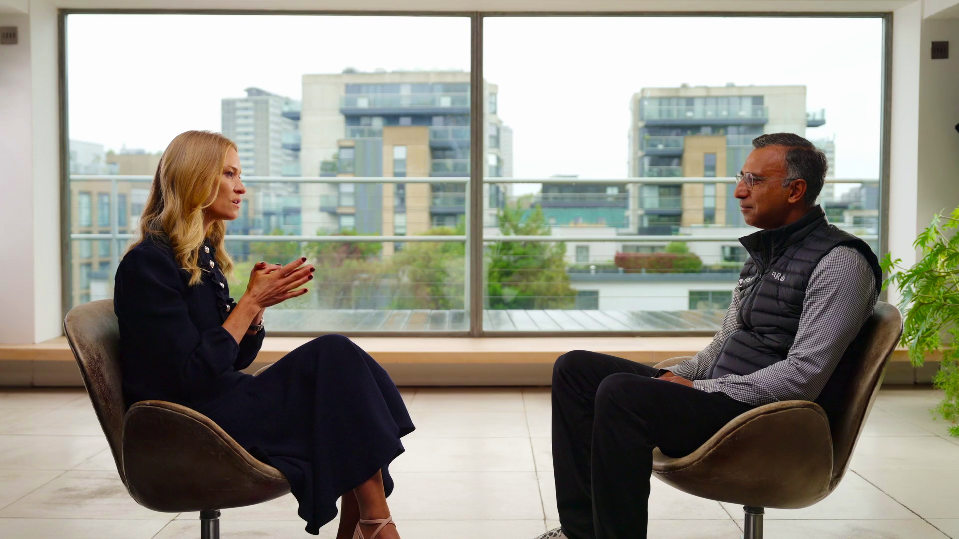 Abhijit Dubey, President. CEO and Chief AI Officer of NTT DATA, Inc., talks with Phillipa Leighton-Jones, SVP of The Trust, The Wall Street Journal